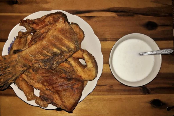 High Angle Closeup Shot Pieces Fried Fish White Plate Next — Stock Photo, Image