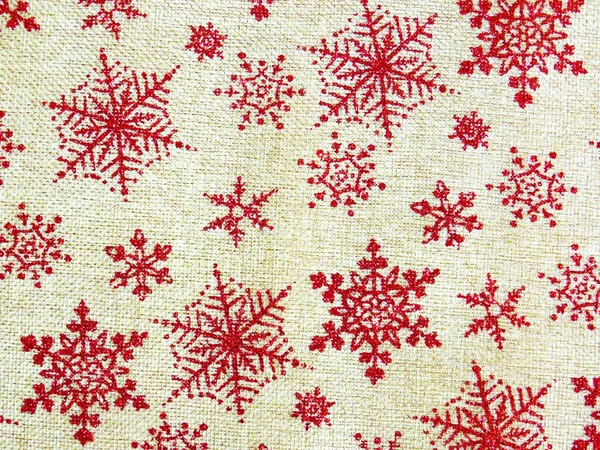 Closeup Shot Red Snowflakes Sewn Light Brown Fabric — Stock Photo, Image