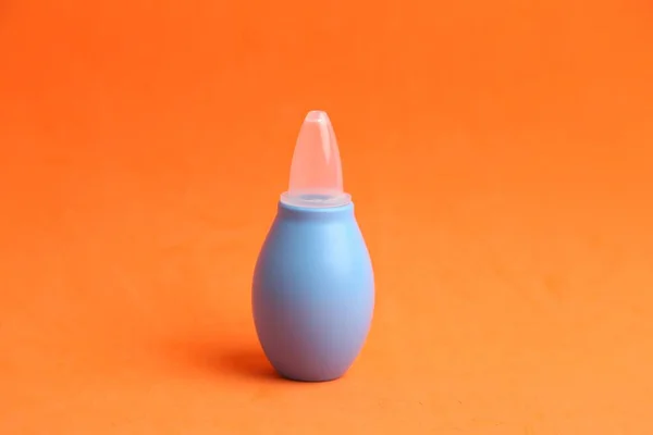 Närbild Bild Blå Nasal Aspirator Orange Bakgrund — Stockfoto