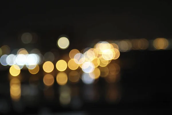 Een Onscherp Beeld Van Nachtlampjes Die Abstracte Bokeh Lampjes Creëren — Stockfoto