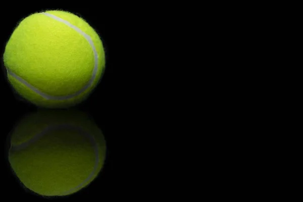 Closeup Shot Reflection Tennis Ball Reflective Black Surface — Stock Photo, Image