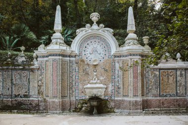 A decorative water fountain in Sintra-Cascais natural park in Portugal clipart