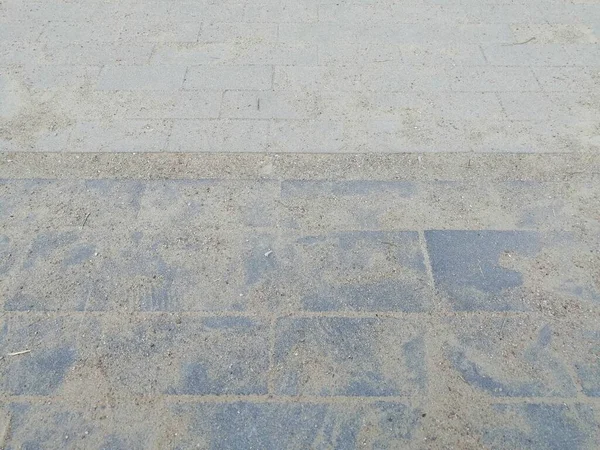 Eine Nahaufnahme Von Sandigen Pflasterplatten Mit Grauer Textur — Stockfoto