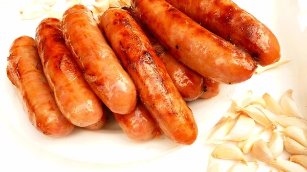 Closeup Delicious Lincolnshire Sausages Garlic Cloves Lights — Stock Photo, Image
