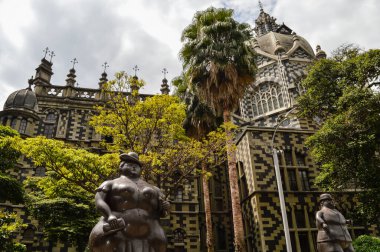 MEDELLIN, COLOMBIA - Jul 01, 2020: statues located in 'Plaza Botero', touristic spot in the city clipart