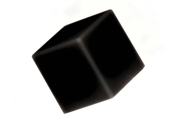 Μια Τρισδιάστατη Απόδοση Ενός Κύβου Σκούρου Χρώματος Που Απομονώνεται Λευκό — Φωτογραφία Αρχείου