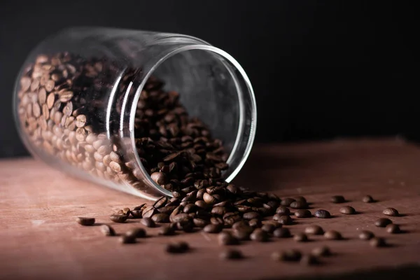 Closeup Jar Roasted Coffee Beans Wooden Table — Stock Photo, Image