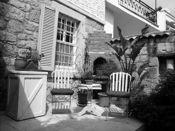 Grayscale Shot Garden Chairs Cushions Terrace Alacati Turkey — Stock Photo, Image