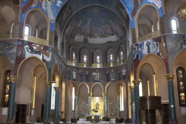 The columns and the walls with beautiful paintings inside of the  Basilica of Santa Rita da Cascia clipart