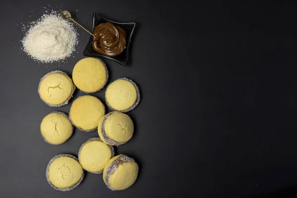 Top View Alfajor Coconut Flakes Melted Chocolate — Stock Photo, Image