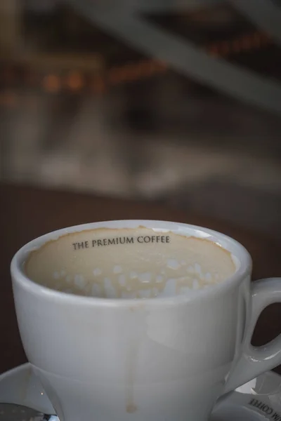 Shallow Focus Shot White Coffee Cup Text Premium Coffee — Stock Photo, Image