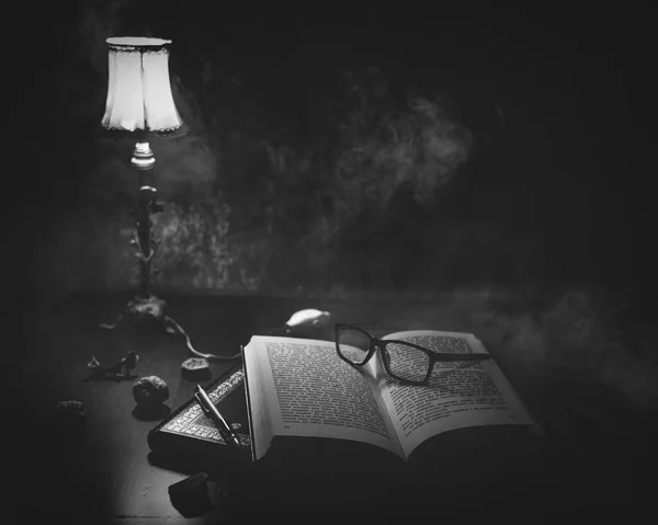 Grayscale Shot Glasses Open Book Lamp Smoke — Stock Photo, Image