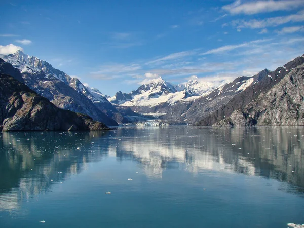 Landscape Mountains Cliffs Surrounded Water Blue Cloudy Sky Stock Image