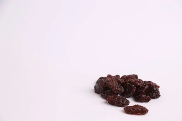 Group Black Raisins Isolated White Background — Stock Photo, Image