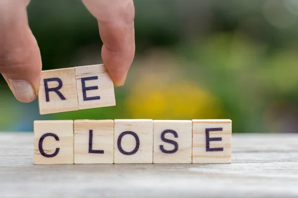 Closeup Person Writing Reclose Wooden Letter Cubes Covid — Stock Photo, Image