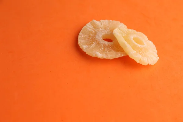 Closeup Shot Delicious Dried Pineapples Orange Surface — Stock Photo, Image