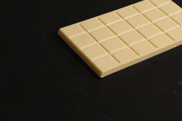 Uma Barra Chocolate Com Leite Isolada Fundo Preto — Fotografia de Stock