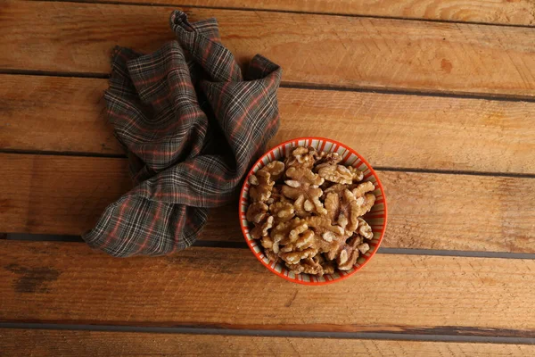 High Angle Shot Bowl Walnuts Napkin Wooden Surface — Stock Photo, Image