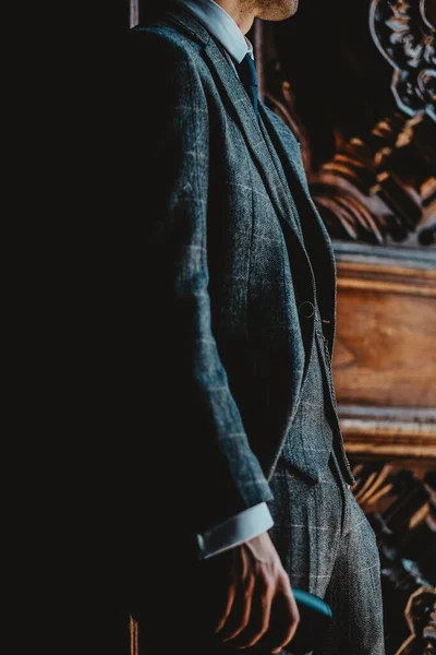 Vertical Shot Elegant Male Classic Checkered Suit Posing Wooden Door — Stock Photo, Image