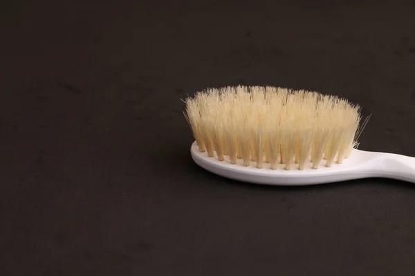 Closeup Shot White Cleaning Brush Black Surface — Stock Photo, Image