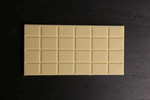 Egy Nagy Szögű Felvétel Egy Rúd Fehér Csokoládé Izolált Egy — Stock Fotó