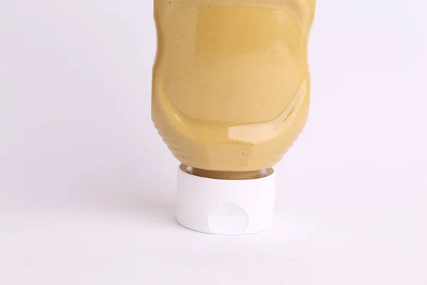 Closeup Shot Pot Mustard Sauce White Background — Stock Photo, Image