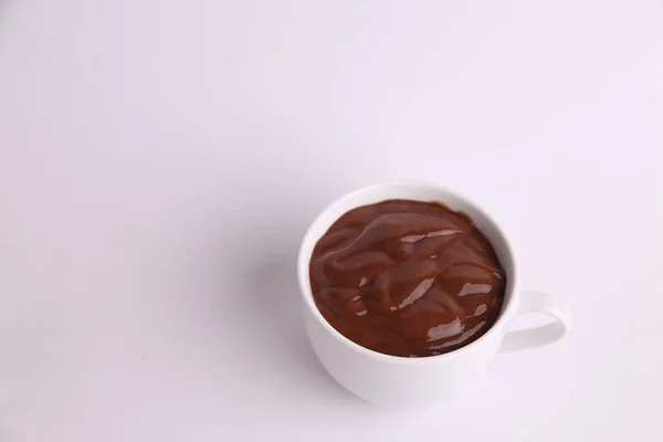 Primer Plano Del Chocolate Derretido Una Taza Blanca Sobre Fondo —  Fotos de Stock