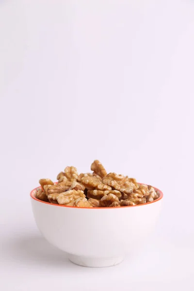 Vertical Shot Bowl Filled Walnuts White Background — Stock Photo, Image