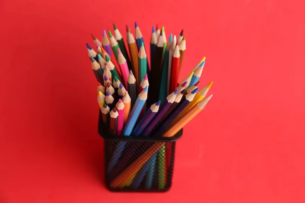 Black Pen Box Full Colored Pencils Red Background — Stock Photo, Image