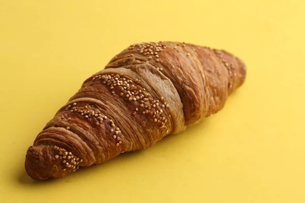 Closeup Shot Croissant Yellow Table — Stock Photo, Image