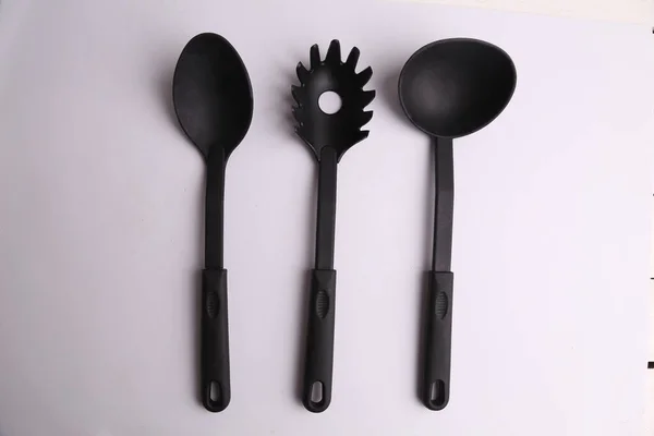 Closeup Black Kitchen Utensils White Background — Stock Photo, Image