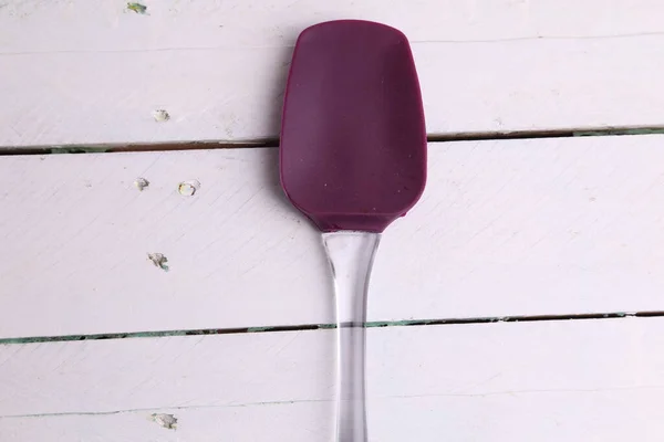 Top View Purple Flexible Spatula White Wooden Surface — Stock Photo, Image