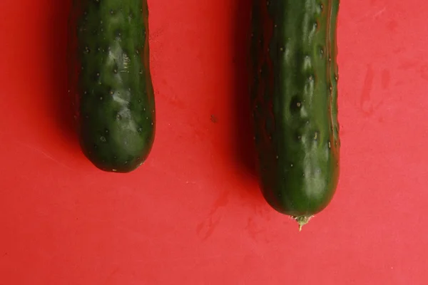Top View Fresh Cucumbers Isolated Red Background — Stock Photo, Image