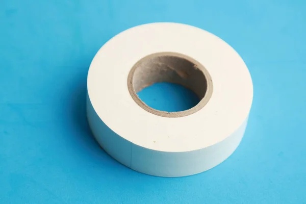 Closeup Shot White Tape Isolated Blue Background — Stock Photo, Image