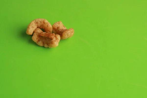 High Angle Shot Three Pieces Fried Chips Isolated Green Surface — Stock Photo, Image