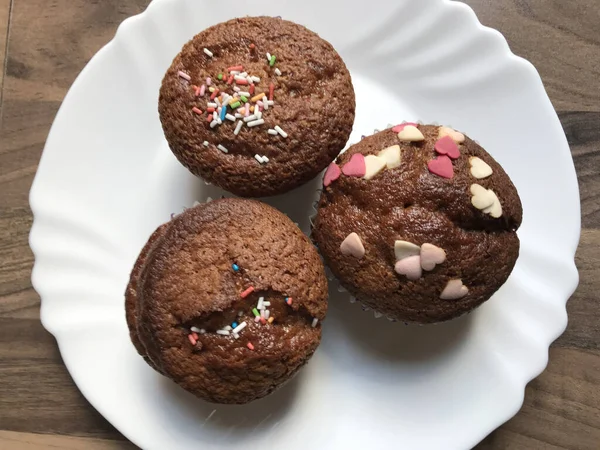 Flat Lay Shot Appetizing Chocolate Muffins Colored Confetti Top — Stock Photo, Image
