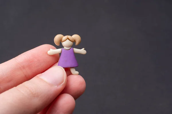 Macro Closeup Shot Person Hand Holding Miniature Figurine Girl Gray — Stock Photo, Image