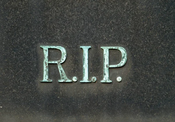 Tombstone Bronze Letters — Stock Photo, Image