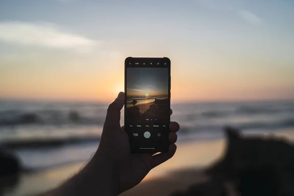 Person Taking Picture Sea Sunset Phone Cala Roche Spain — Foto de Stock