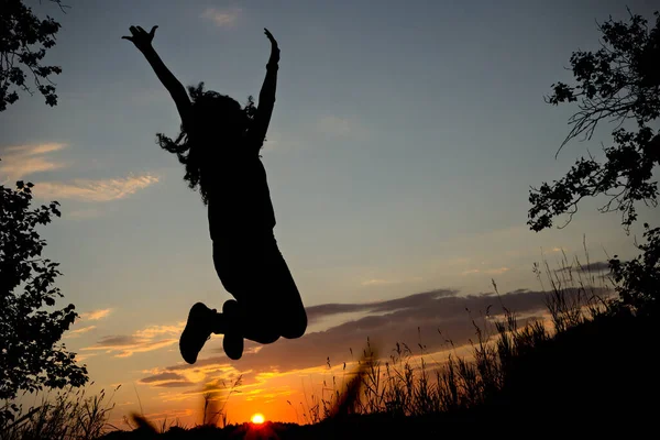 Silhouette Happy Joyful Female Jumping Having Fun Sunset — Stock Photo, Image