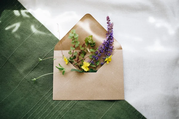 High Angle Shot Lavender Small Yellow Flowers Envelope White Green Stock Photo
