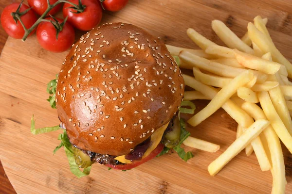 Top View Delicious Beef Burger Wooden Board French Fries Tomatoes — Stock Photo, Image