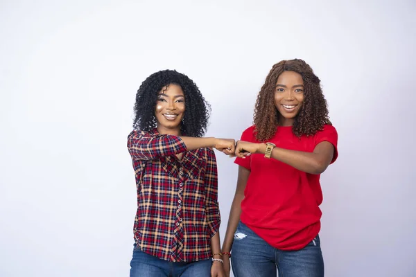 Closeup Shot Two Beautiful African Girls Fist Bumping — Stock Photo, Image