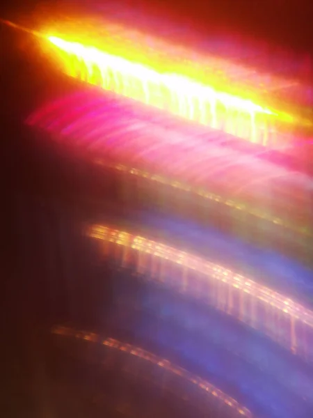 Sebuah Gambar Abstrak Dari Lampu Berwarna Warni Pada Latar Belakang — Stok Foto