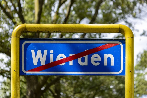 WIERDEN, NETHERLANDS - Jul 30, 2020: Traffic sign denoting that you are about to exit a residential area in which speed limits are no longer the same — Stock Image Wierden Netherlands Jul 2020 Traffic Sign Denoting You Exit Residential Stock Image