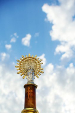 Virgin of Pilar from Zaragoza, city of Spain, and background sky. clipart