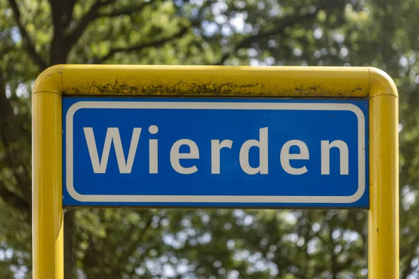 WIERDEN, NETHERLANDS - Jul 30, 2020: Traffic sign denoting that you are about to enter a residential area in which speed limits are in place — Stock Image Wierden Netherlands Jul 2020 Traffic Sign Denoting You Enter Residential Royalty Free Stock Photos