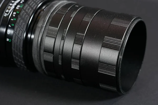 Closeup Camera Lens Table Lights Blurry Background — Stock fotografie