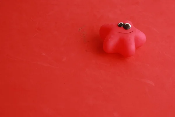 Rubber Starfish Toy Red Surface — Stock fotografie