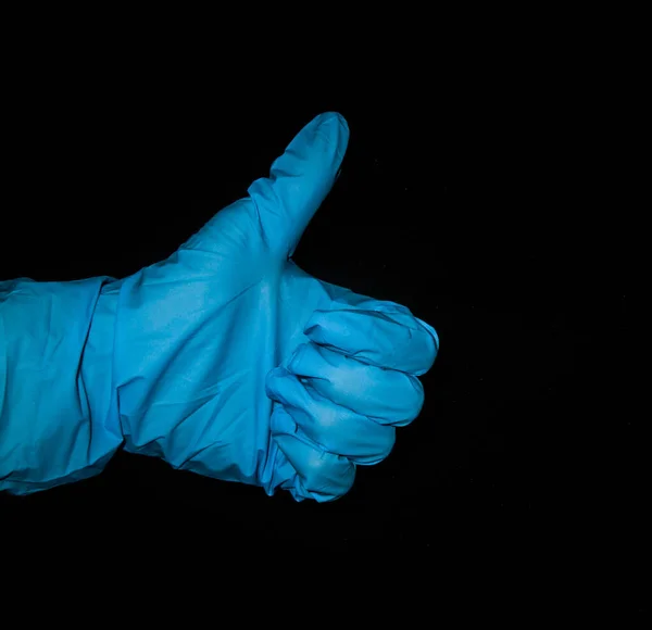 Egy Elszigetelt Közelkép Egy Kézről Egy Orvosi Gumikesztyűben Ami Hüvelykujjat — Stock Fotó